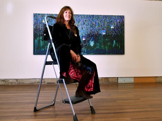 Aboriginal artist Bronwyn Bancroft poses for a photo with her artwork, <span id="U323729338335NbB" style="font-weight:normal;font-style:italic;">Falling Through Time</span> at the Sydney College of the Arts in Rozelle. Picture: Joel Carrett