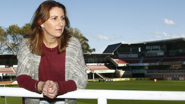 Claire Gallagher at Brookvale Oval where she believes she contracted Ross River Virus from a mosquito bite back in 2013. Picture: John Appleyard