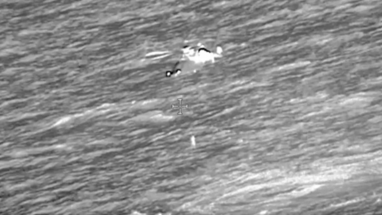 Footage shows an air ambulance worker being winched down to find the woman. Picture: Channel Islands Air Search