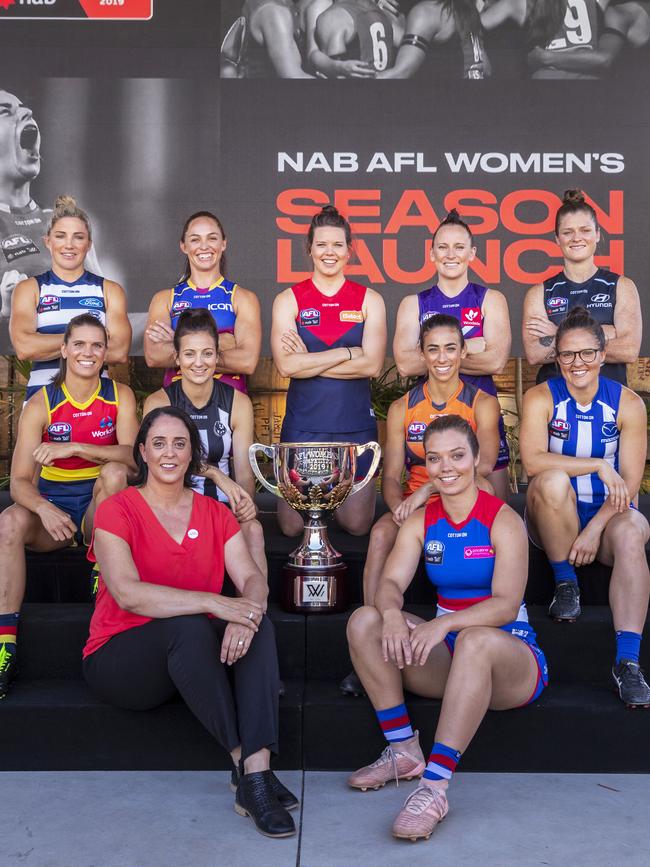 Nicole Livingstone (bottom, left) with AFLW captains (L-R back row) Melissa Hickey, Leah Kaslar, Elise O'Dea, Kara Donnellan, Bri Davey. (L-R middle row): Chelsea Randall, Steph Chiocci, Amanda Farrugia, Emma Kearney. (Front row): Ellie Blackburn. PHOTO: AAP Image/Daniel Pockett