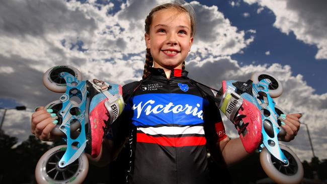 Billie Russell at the age of nine with her speed skates. Picture: Stuart Milligan