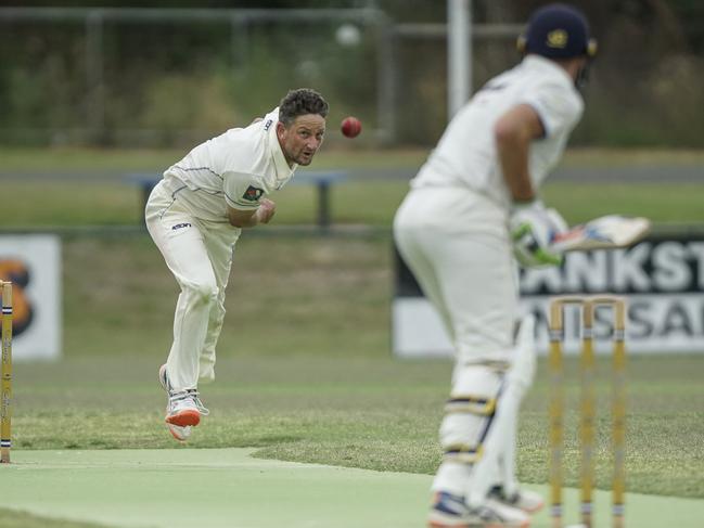 Old Peninsula bowler Rhys Whitling bowls to Mal Coutts.