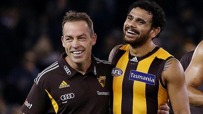 Alastair Clarkson and Cyril Rioli after Hawthorn’s win over North Melbourne. Picture: Colleen Petch.