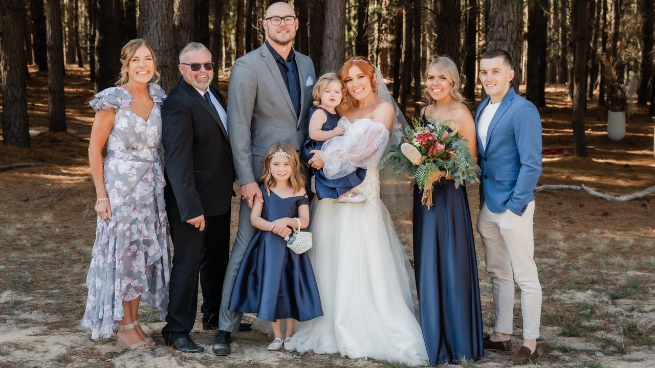 A new generation of FIFO workers. John Easton has worked in FIFO for several decades. He is pictured with wife Marianne at his eldest daughter Jessica’s wedding to FIFO husband Buck Williams (with their girls, Evelyn, 5, and Elaina, 18 months). Sister Sophie’s partner, Jack Ford, is also a FIFO worker. Picture: Supplied