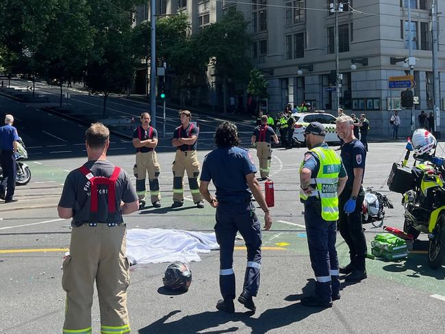 Police have blocked off parts of Flinders St near the bottom of Exhibition St after a motorcyclist was killed in a fatal collision. Picture: Supplied