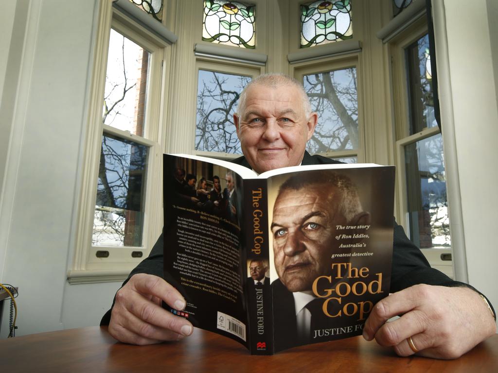 Former homicide squad detective Ron Iddles with Justine Ford’s book <i>The Good Cop</i>. Picture: David Caird