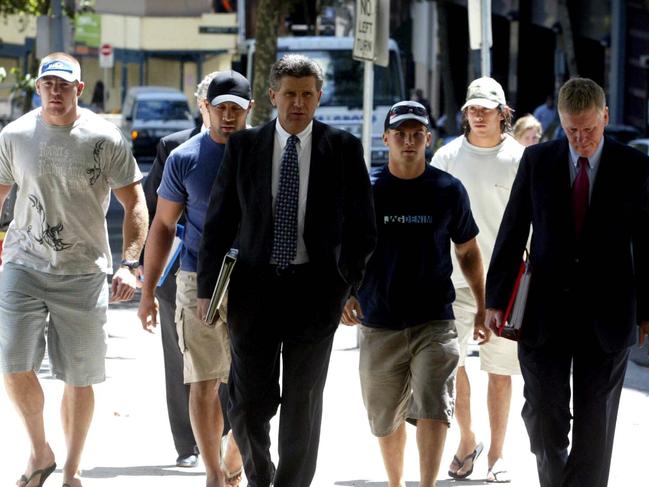 Mark O'Meley, Roy Asotasi, Brett Oliver and Johnathan Thurston leave Sydney Police Centre in Surry Hills after giving DNA evidence and video testimony. No players pictured were involved. Picture: Glenn Campbell.