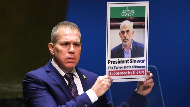 Israeli Ambassador to the United Nations Gilad Erdan holds up a picture of Hamas leader Yahya Sinwar during a special session of the UN General Assembly in May.