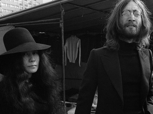 (FILES) In this file photo taken on March 22, 1969 Beatle John Lennon and his wife Yoko Ono visit the Paris Flea Market. - When the members of the Beatles went their separate ways in the early 1970s, few predicted that half a century later the iconic band would still dominate pop music culture. But, with Friday marking the 50th anniversary of their unofficial break-up, the so-called "Fab Four" appear as popular and omnipresent as ever. (Photo by MYCHELE DANIAU / AFP)