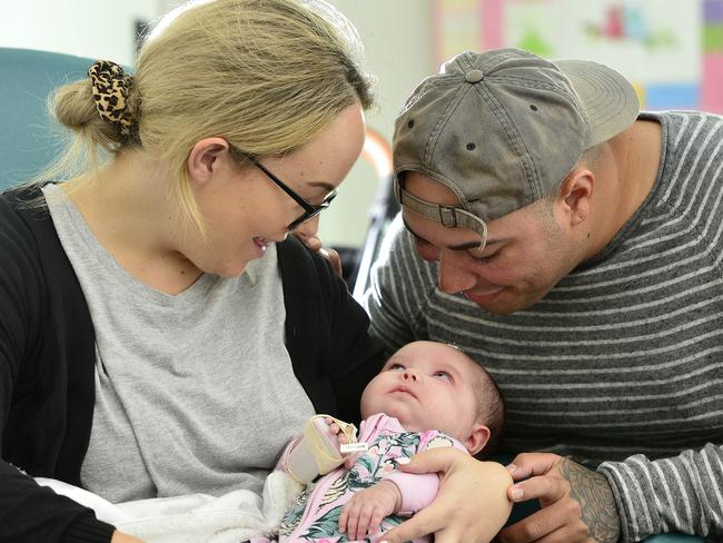 Newborn girl Rylee Gardner, pictured with dad Logan Gardner and mum Aime Rootsey is being transported to Brisbane for treatment after suffering seizures. PICTURE: MATT TAYLOR.