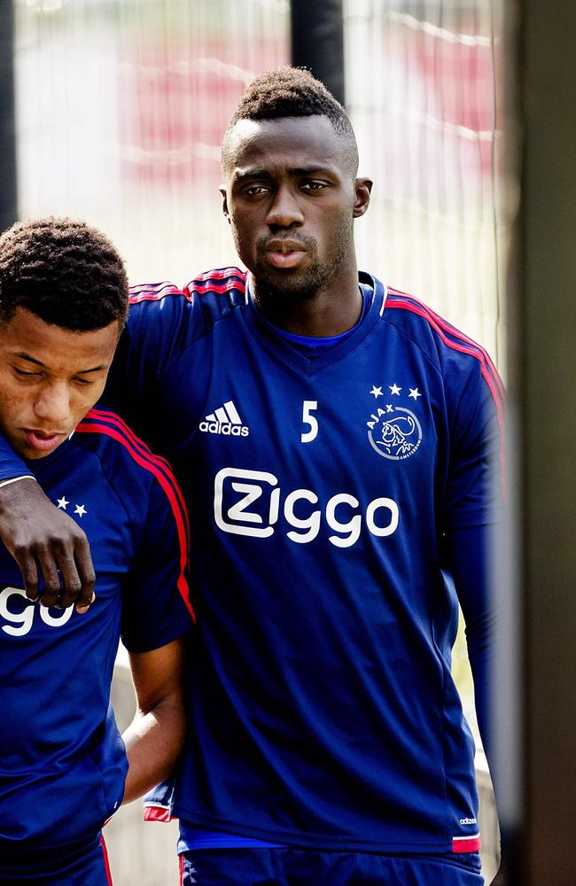 David Neres (L) and Davinson Sanchez of Ajax