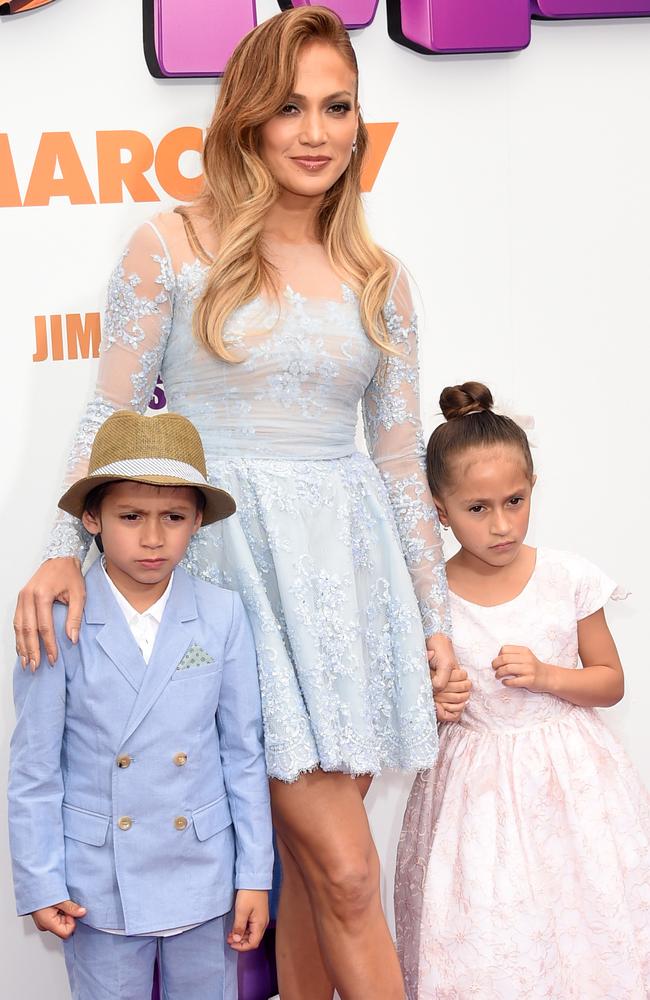 Not amused ... giving their best ‘this is boring’ faces, J-Lo’s adorable twins Max and Emme on the Home red carpet.