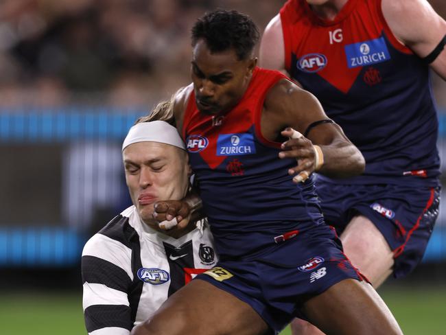 Kysaiah Pickett makes heavy contact with Darcy Moore. (Photo by Darrian Traynor/Getty Images)