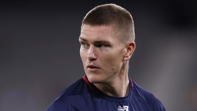 MELBOURNE, AUSTRALIA - JULY 23: Adam Tomlinson of the Demons warms up before  the round 19 AFL match between the Western Bulldogs and the Melbourne Demons at Marvel Stadium on July 23, 2022 in Melbourne, Australia. (Photo by Darrian Traynor/Getty Images)