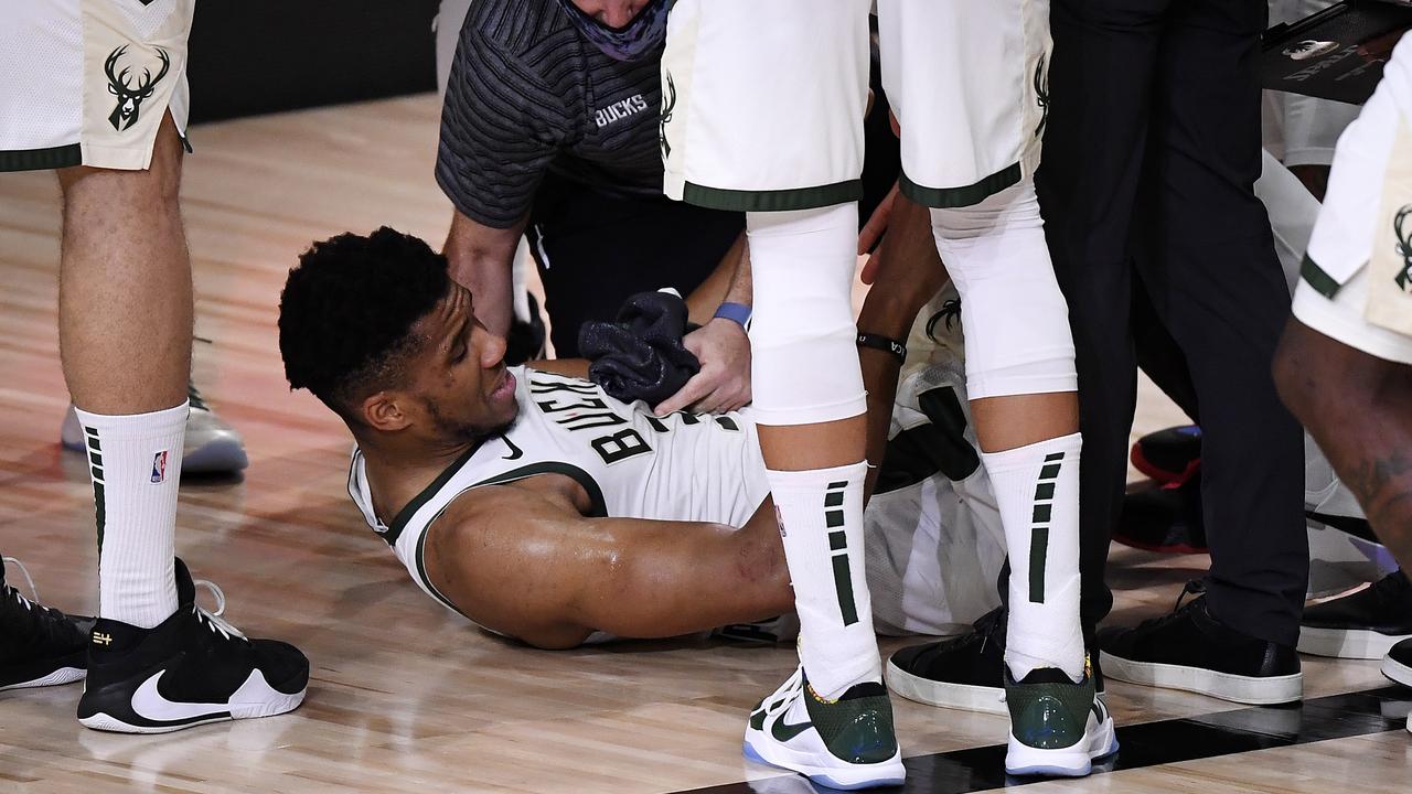 Giannis Antetokounmpo exits the game after an injury during the second quarter. Picture: Douglas P. DeFelice/Getty Images