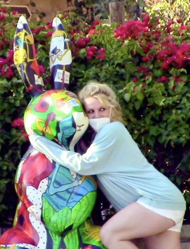 Britney emerges from her mansion for a photo with this bunny. Picture: RF/Coleman-Rayner