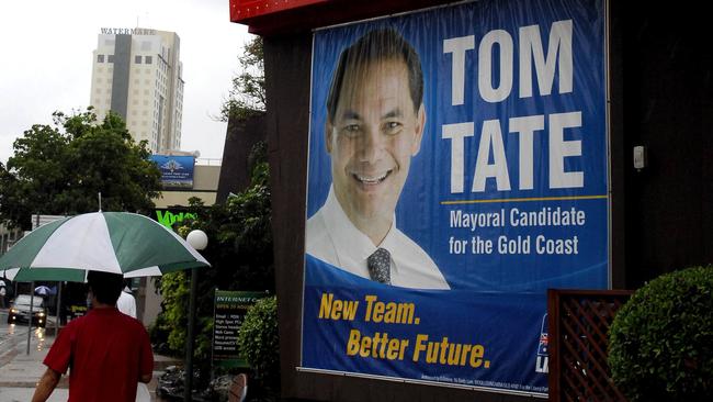 Mayor Tom Tate’s campaign signs on the front of the Islander before he was elected.