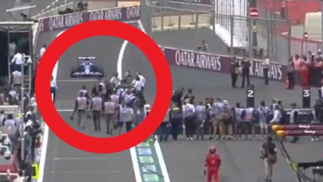 Esteban Ocon in pit lane.