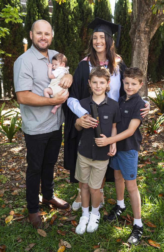 Master of Education (Guidance and Counselling) graduate Kirsten Doecke with husband Matt Doecke and their kids baby Ash, Taj and Jax (right) at a UniSQ graduation ceremony at The Empire, Tuesday, October 29, 2024. Picture: Kevin Farmer