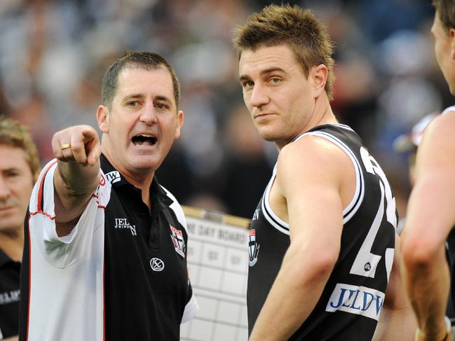 St Kilda coach Ross Lyon gives Sam Fisher instructions against Collingwood in 2009. Picture: George Salpigtidis