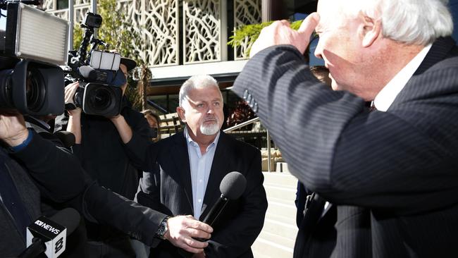 Abuse victim Peter Gogarty (centre) was verbally insulted by a member of Wilson’s entourage. Picture: AAP / Darren Pateman