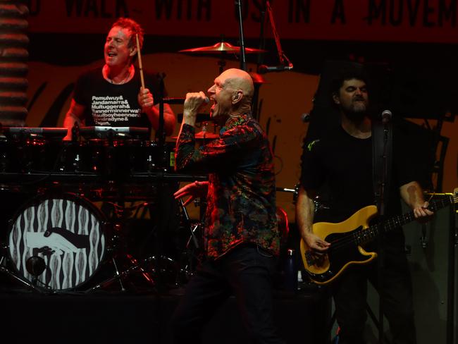 Peter Garrett with drummer Rob Hirst and new bassist Adam Ventoura. Picture: David Clark