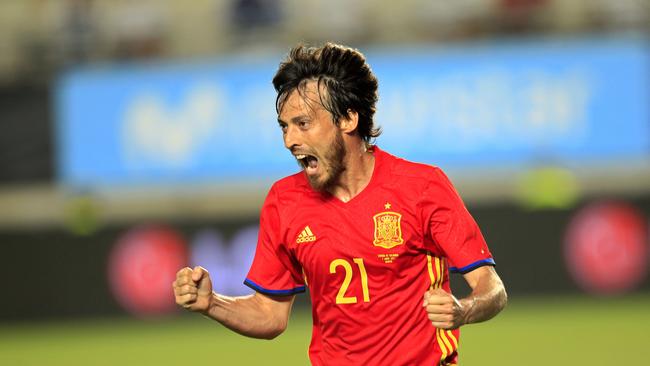 Spain's David Silva celebrates after scoring