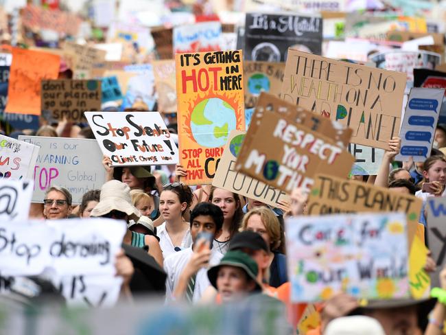 School students take part in the climate change strike in Brisbane. Picture: AAP/Dan Peled