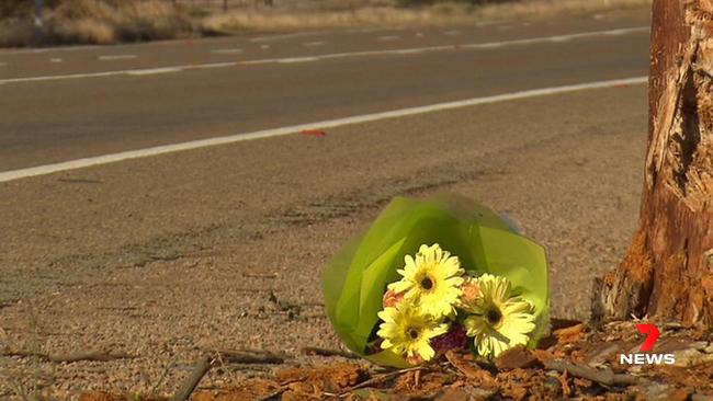 Flowers left in tribute for the man and his mother after the scene of the crash at Baroota. Picture: 7NEWS