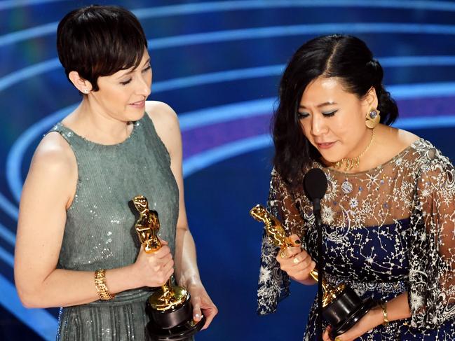 Becky Neiman-Cobb and Domee Shi accept the Short Film (Animated) award for 'Bao'. Picture: Getty Images 