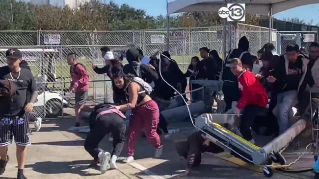 Festival attendees break through barricades/gates at NRG Park, the venue of the Astroworld festival. Picture: Twitter