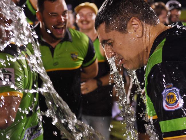 Palmerston Raiders classic gatorade dump on coach Merg Mikaelian as they celebrate winning the NRLNT Grand Final 2022. Picture: (A)manda Parkinson