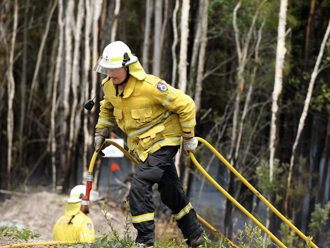 Rural Fire Service deal with a blaze alongside the highway at New Italy.