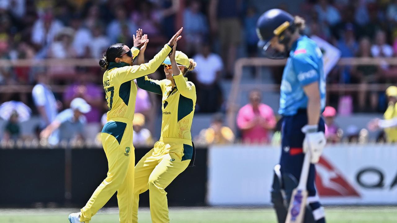 SYDNEY, AUSTRALIA - JANUARY 12: Alana King of Australia celebrates with teammate Phoebe Litchfield after taking the wicket of Amy Jones of England during game one of the Women's Ashes ODI series between Australia and England at North Sydney Oval on January 12, 2025 in Sydney, Australia. (Photo by Ayush Kumar/Getty Images)