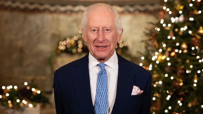 Britain's King Charles III smiles during the recording of his Christmas message at the Fitzrovia Chapel in central London on December 11, 2024. This year marks the first time the Sovereign's Christmas message has been filmed outside a Royal residence since 2006, when it was filmed at Southwark Cathedral. (Photo by Aaron Chown / POOL / AFP)