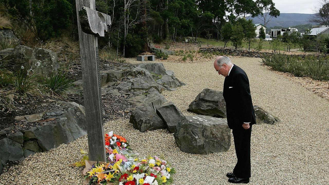 Former Australian Prime Minister John Howard lays a wreath at the memorial site of the Port Arthur massacre during a memorial service to mark the 10th anniversary. Picture: Getty Images