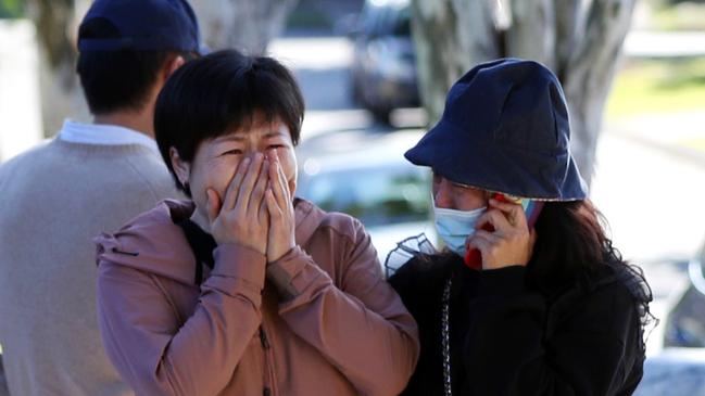 Several people broke down in tears at the site on Monday. Picture: Nigel Hallett