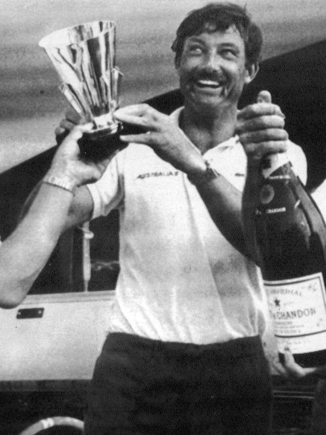 John Bertrand celebrating winning of the America's Cup.