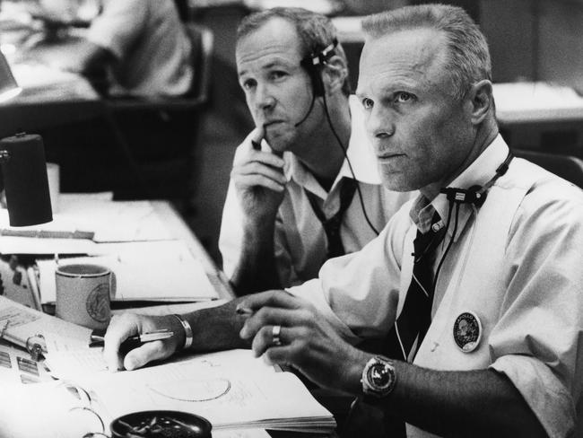 McClure with Ed Harris in <i>Apollo 13</i>.