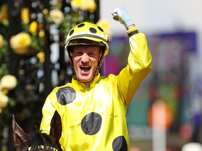 MELBOURNE, NOVEMBER 7, 2023: 2023 Melbourne Cup Day at Flemington Racecourse. Mark Zahra celebrates winning the Melbourne Cup on Without A Fight. Picture: Mark Stewart