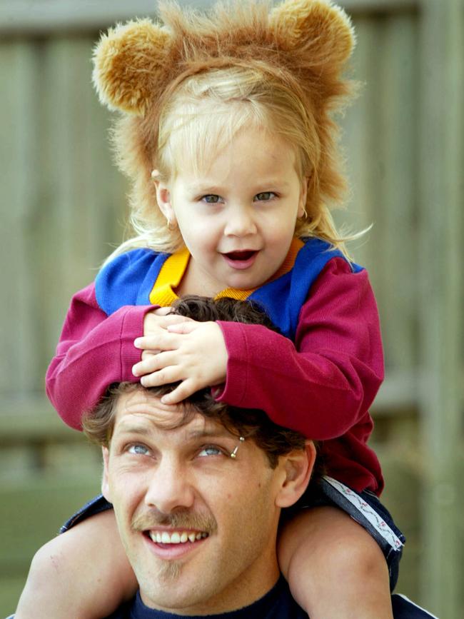 Too cute: Jess, age 2, on the shoulders of dad Darryl.