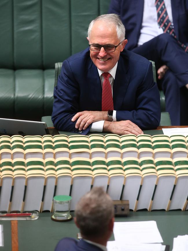 Malcolm Turnbull grins at Opposition Leader Bill Shorten during Question Time. Picture: Kym Smith