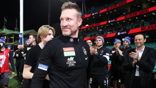 Magpies head coach Nathan Buckley celebrates victory after coaching his final game for the Magpies in 2021. Picture: Matt King