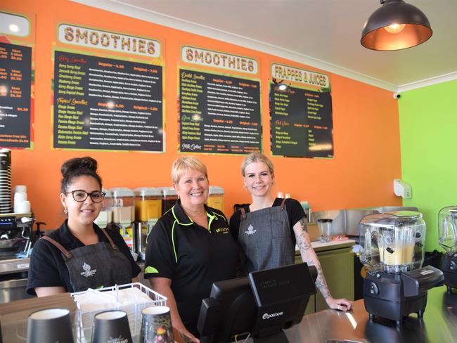 Kiahnee Eggmolesse, Sandra Rowcliffe and Lauren Stevens on the opening day of the North Rockhampton store.