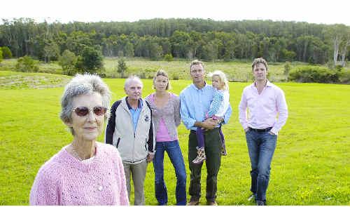 Goalposts shifted: Concerned Greenwood Grove residents stand on a plot of land at the up-market Lennox Head residential estate where 48 of the proposed 74 affordable housing units could be built. . Picture: Jerad Williams