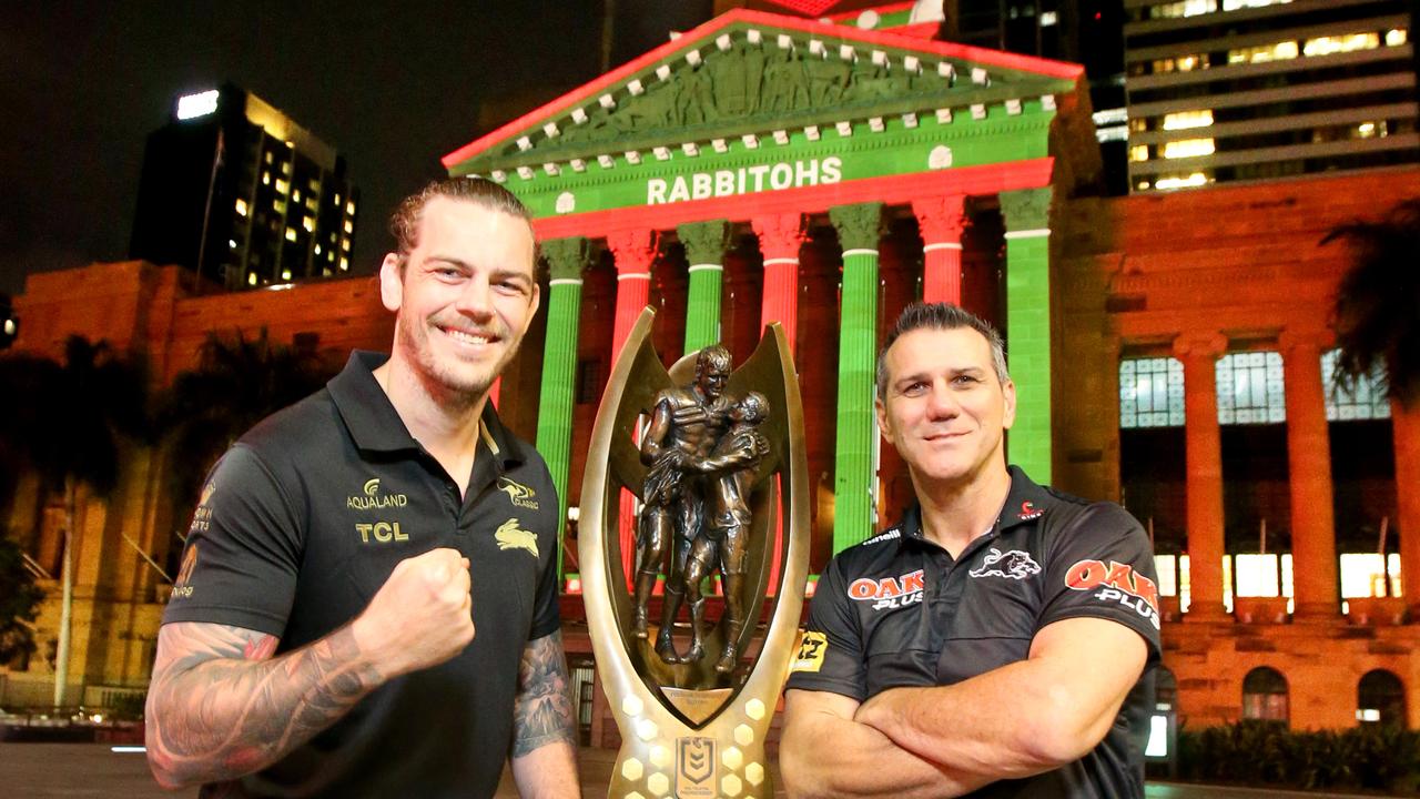 Former Souths forward Ethan Lowe and ex-Panthers star Scott Sattler with this year’s NRL premiership trophy. Picture: Steve Pohlner