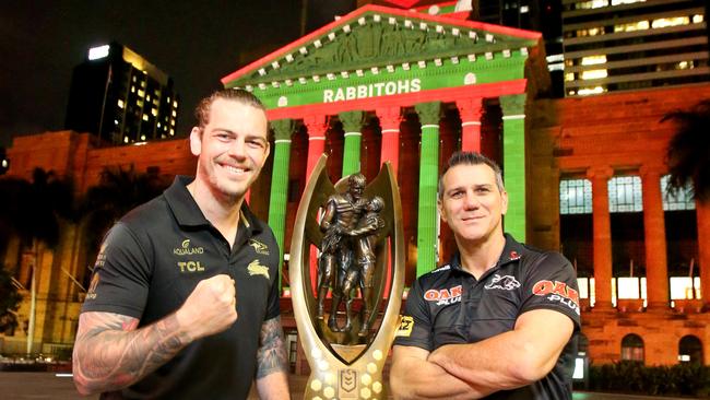 Former Souths forward Ethan Lowe and ex-Panthers star Scott Sattler with this year’s NRL premiership trophy. Picture: Steve Pohlner