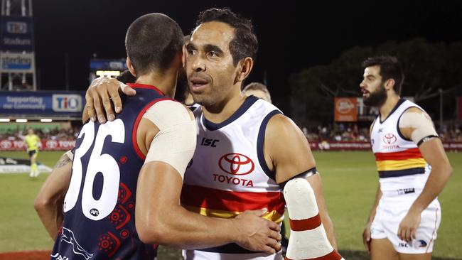 Eddie Betts of the Crows embraces Jeff Garlett of the Demons before the 2019 AFL round 11 match at TIO Stadium in Darwin. Picture: Dylan Burns/AFL Photos