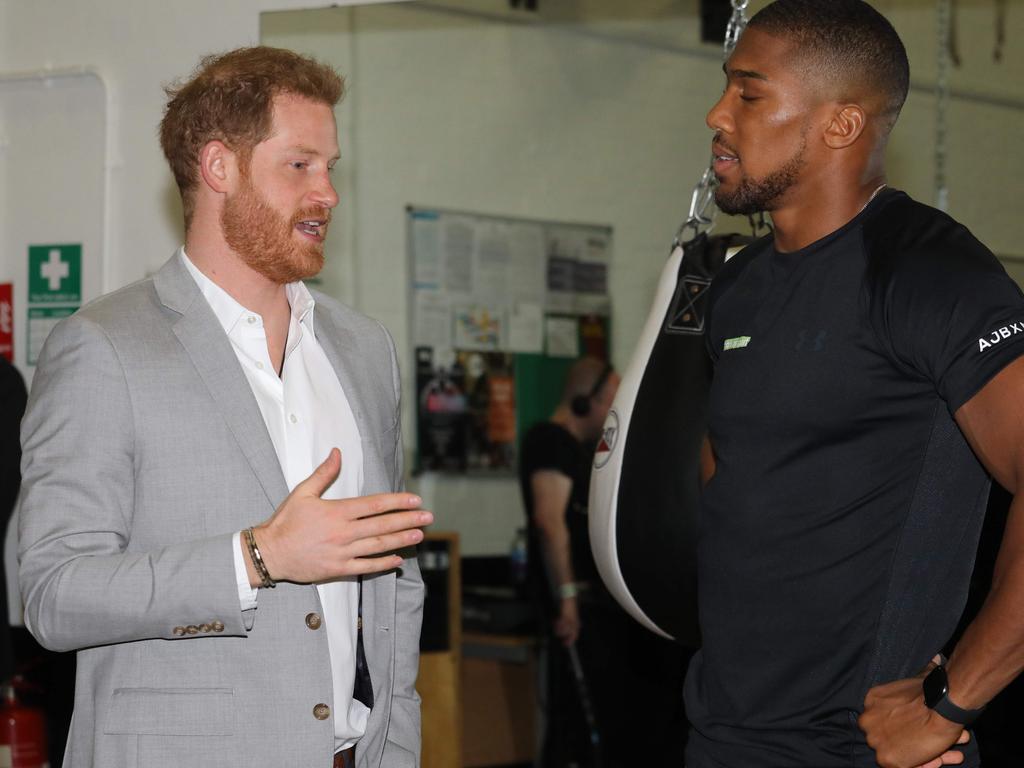 Prince Harry met with British champion boxer Anthony Johnson last week. Picture: AFP