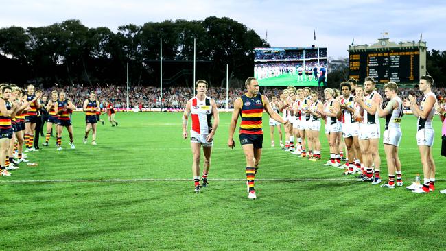 Adelaide and St Kilda formed a guard of honour for retiring greats Lenny Hayes and Ben Rutten. Picture: Sarah Reed